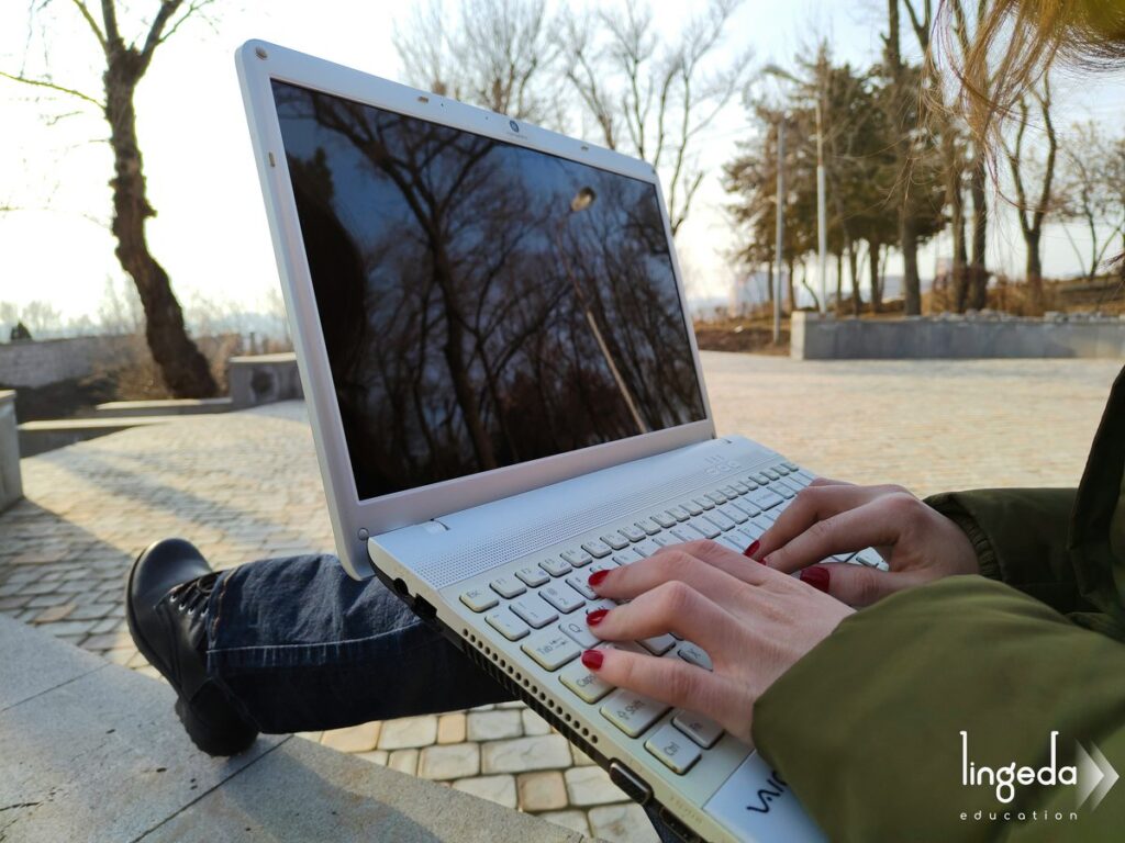 Learner studying English on mobile device in various locations
